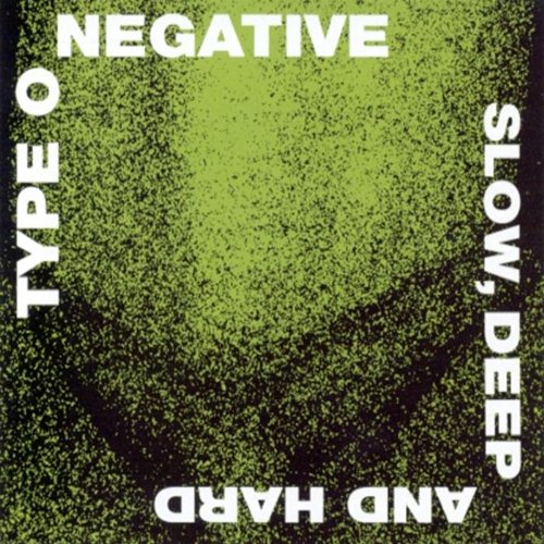 "Album cover with white text on black and green speckled background."