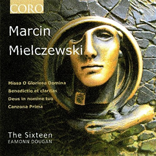 CD cover featuring a gold statue of a robed figure against a stone background.
