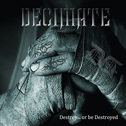 Album cover: hands with boxing wraps and tribal tattoos, dark background.