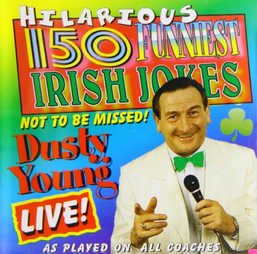 "Dusty Young in a white suit and green bow tie, holding a microphone."