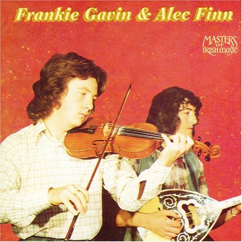 "Album cover featuring two men playing violin and mandolin against a red background."