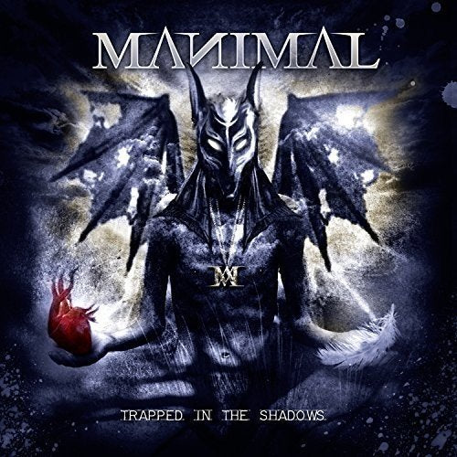 CD cover: Anubis-like figure with wings, holding a flaming heart.