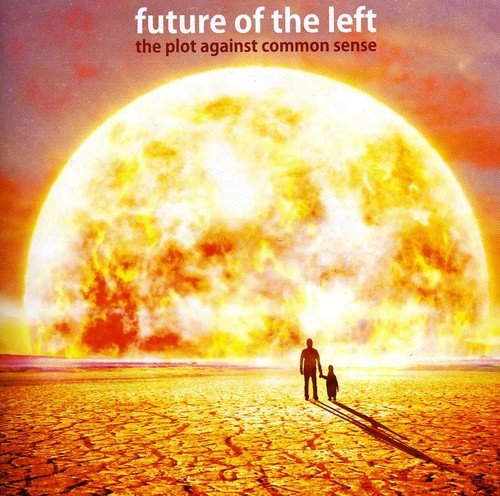 A CD cover featuring a man and child walking towards a large, fiery sun.