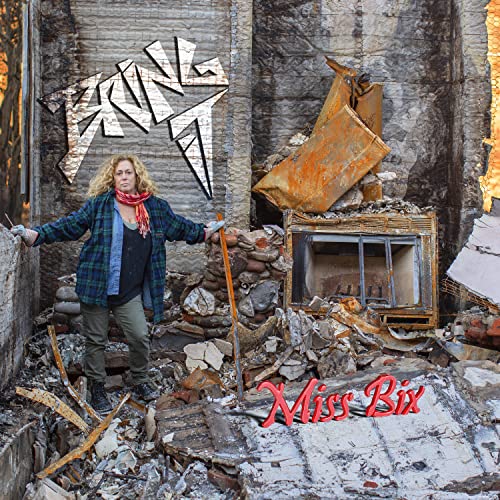 CD cover for Miss Bix’s “Bring It” featuring a woman in front of rubble.
