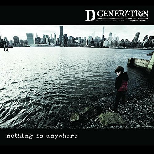 Black and white album cover with boy standing on rocks by a city skyline.