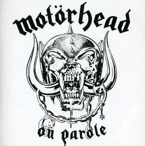 "Black and white album cover with a snarling skull wearing a spiked collar."