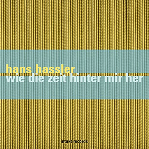 A music album cover with a yellow and blue striped background, featuring the artist's name "hans hassler" and album title "wie die zeit hinter mir her" in yellow and white text, with the record label "intakt records" at the bottom.