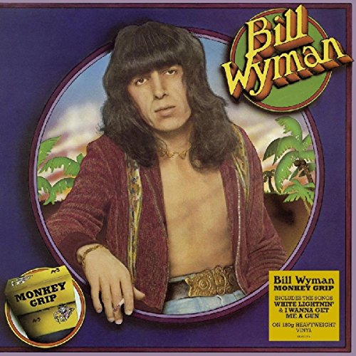 "Bill Wyman album cover featuring a man with long hair against a tropical background."