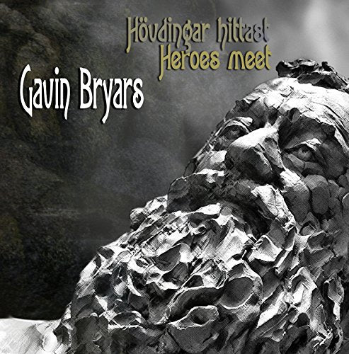"CD cover with crumpled paper sculpture of a bearded man's head, dark background."