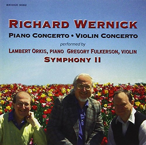 "CD cover with three men sitting in a field of red and yellow flowers."