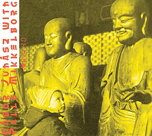 CD cover: golden Buddha statues with red and black text overlay.