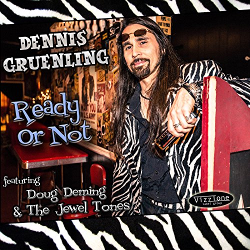 "Album cover featuring a man with long hair in a zebra-print jacket holding a microphone."
