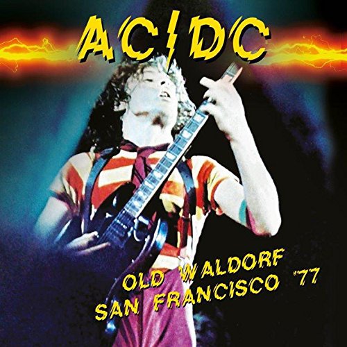 AC/DC album cover featuring a guitarist performing on stage.