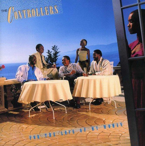 "Album cover with four men at tables and two women, overlooking the ocean."