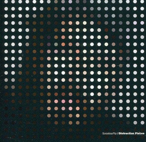 A black album cover with a grid of multicolored dots forming a face.