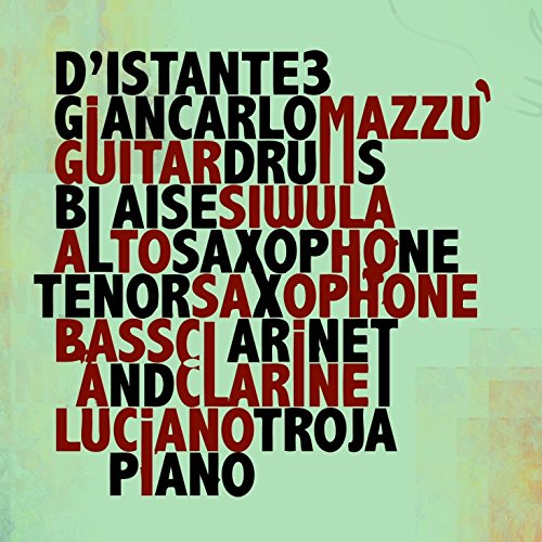 Album cover with green background, featuring typographic text in black and red.