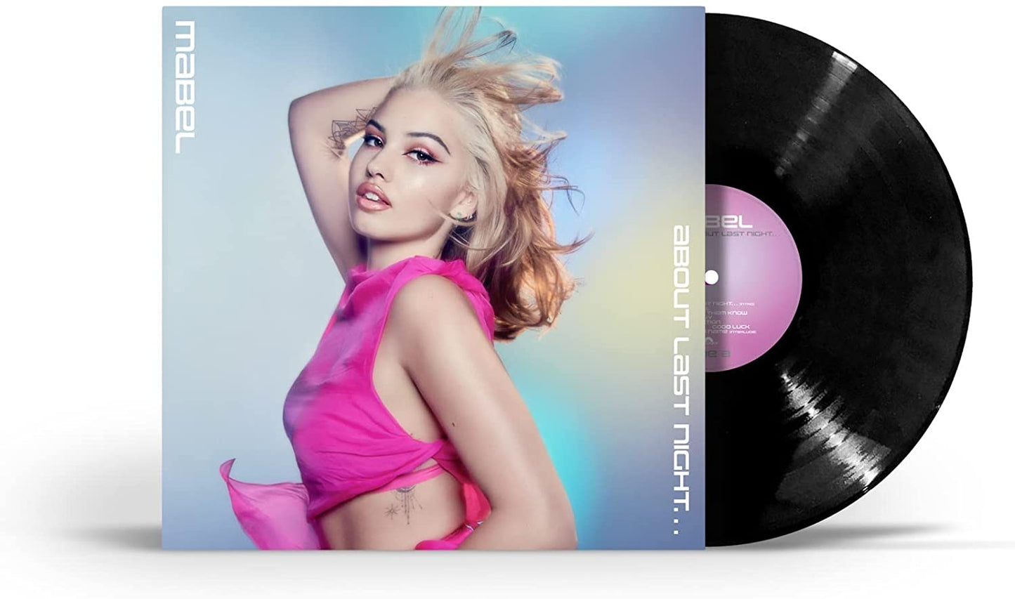 Album cover featuring a blonde woman in a pink top against a blue background.