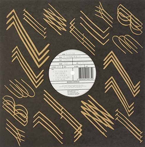 Black vinyl record label with gold geometric design and barcode.