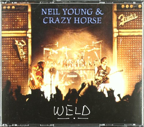 "Album cover featuring Neil Young and Crazy Horse performing on stage with a crowd."