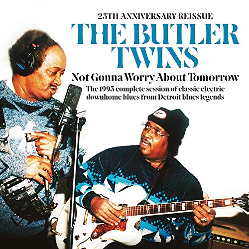 Album cover featuring two men, one singing, one playing guitar, against a white background.