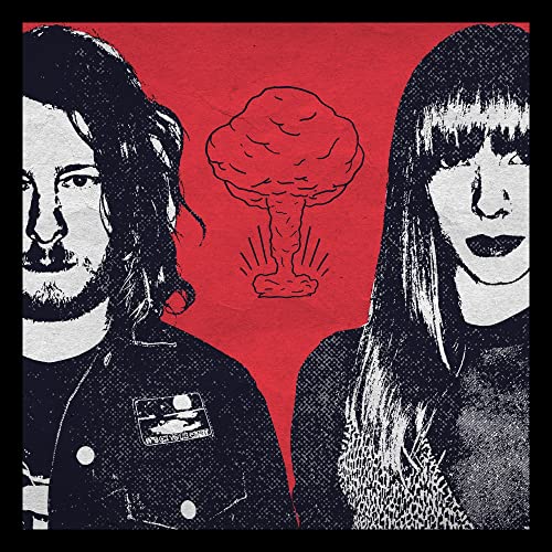 Two people with dark hair flank a red mushroom cloud on a red background.