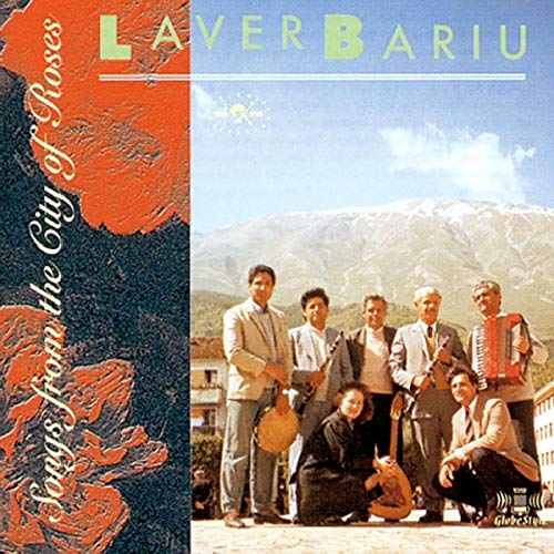 CD cover featuring a group of musicians with a mountain backdrop.