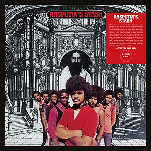 Vinyl album cover featuring a group of musicians and a portrait.