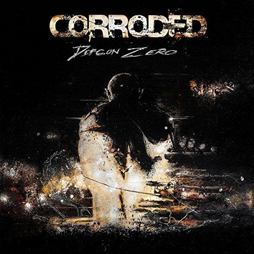 "Album cover with a dark figure and distressed text 'Corroded - Defcon Zero'."