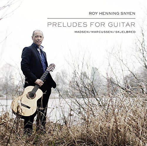 "CD cover featuring a man holding a guitar in a field with bare bushes."