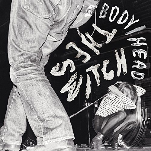 Black and white album cover featuring people and handwritten text.