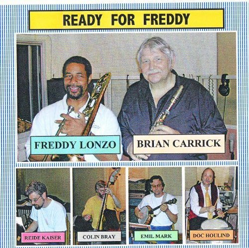 "CD cover featuring a man holding a trombone, wearing a white shirt."