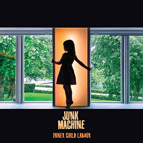 Silhouette of a child standing in a doorway framed by trees.