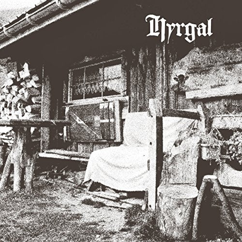 "Black and white album cover with 'Hyrgal' text, showing a wooden cabin and wooden objects."