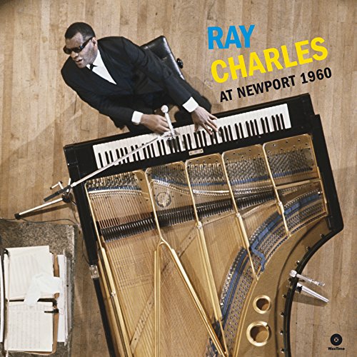 Ray Charles playing a grand piano, viewed from above, with album title text.