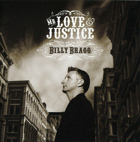 "Album cover with Billy Bragg standing between buildings, sepia-toned, with title and artist name."