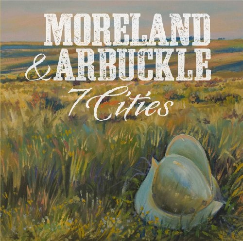 "CD cover art featuring a helmet in a field with 'Moreland & Arbuckle 7 Cities' text."
