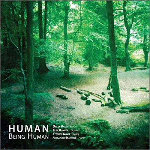 The image is a CD cover for "Human - Being Human" with a forest scene. Alt text: Forest clearing with logs and trees, green-toned, with white text overlay.