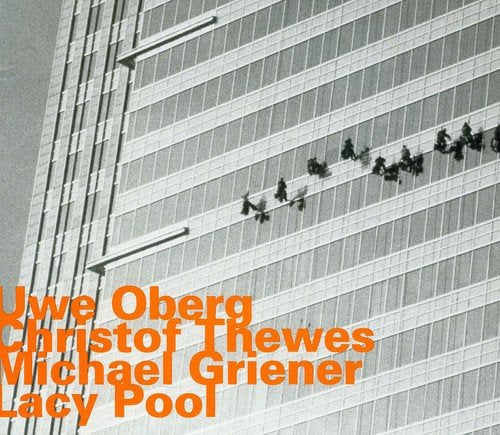 "CD cover with black and white building image and orange artist names."