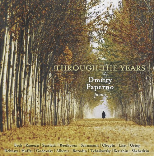 "CD cover with a person walking down a tree-lined path, Dmitry Paperno piano album art."