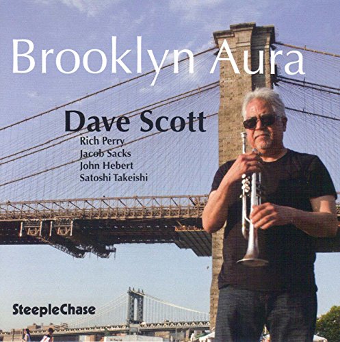 "Album cover with a man holding a trumpet in front of the Brooklyn Bridge."