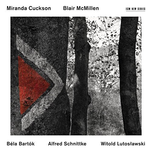 "Album cover with tree trunks and red arrow on a white background."