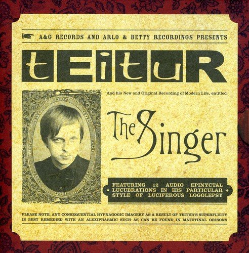 CD album cover with a portrait and ornate, vintage-style design.