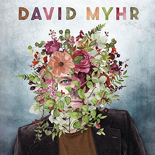 Album cover art: a man with flowers covering his face, wearing a brown shirt.