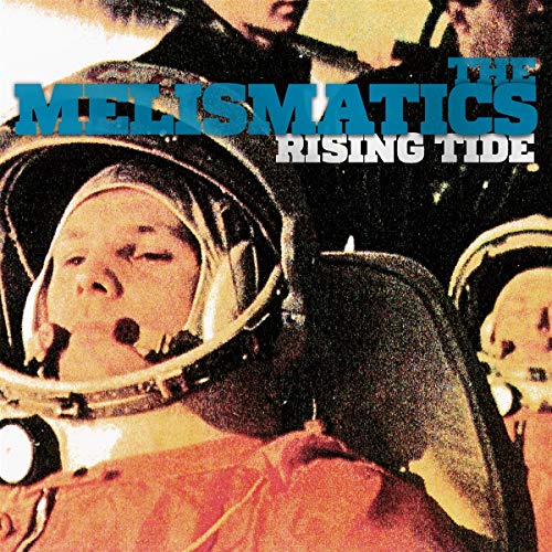 Album cover: baby in space suit with adults in the background.