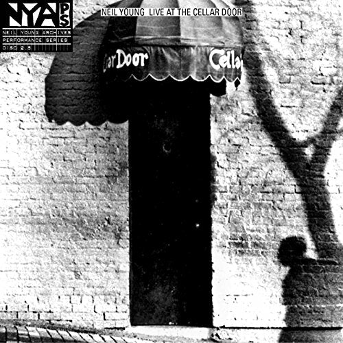 Black and white album cover featuring a cellar door and shadow.
