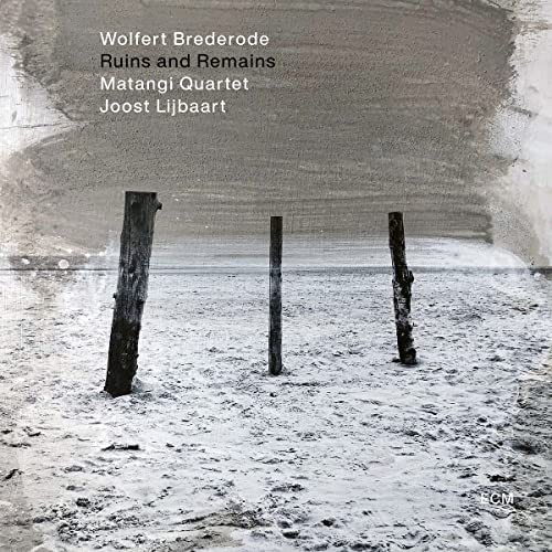 CD cover: weathered posts in a sandy, textured landscape.