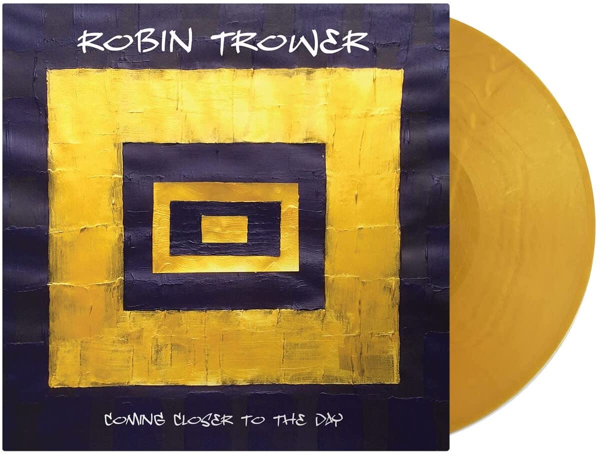 Robin Trower album cover with gold vinyl record beside it.