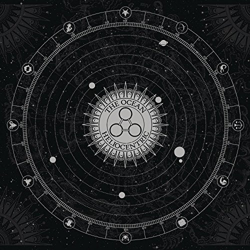 The image is a black-and-white album cover featuring a circular, astronomical design. Alt text: Black album cover with white astronomical diagram and "The Ocean" text.