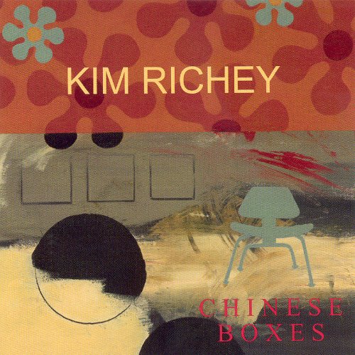 "Album cover art for 'Chinese Boxes' by Kim Richey, featuring abstract shapes and a chair."
