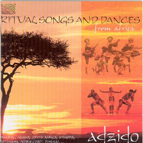 "Album cover featuring silhouetted dancers and a tree against an orange sunset background."